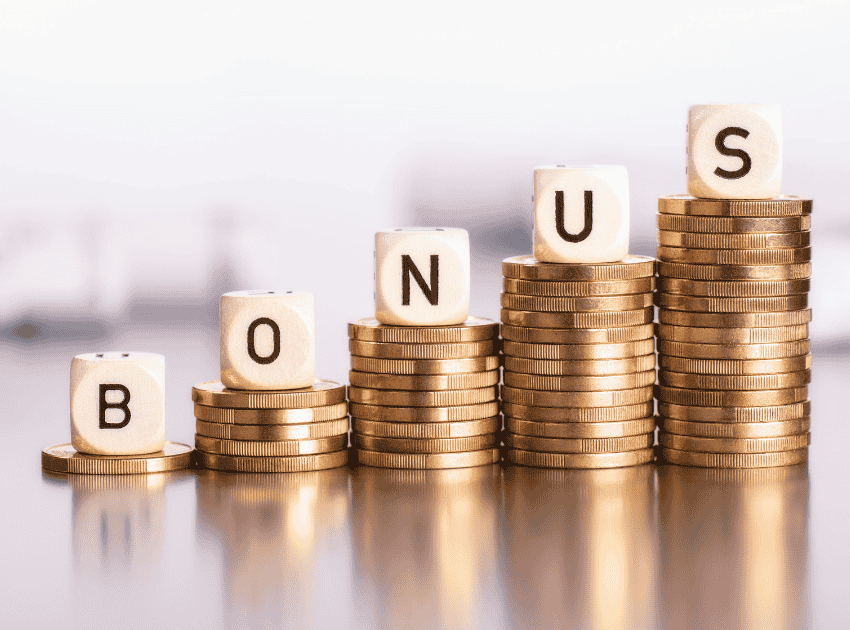 Stacking coins with bonus letters on each stack