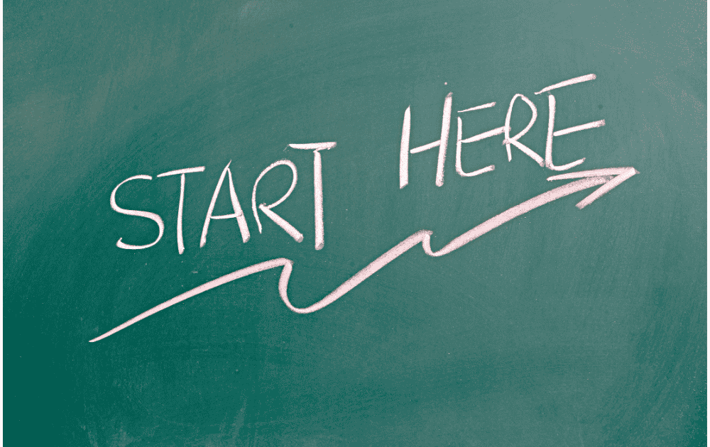 Chalkboard with "start here"